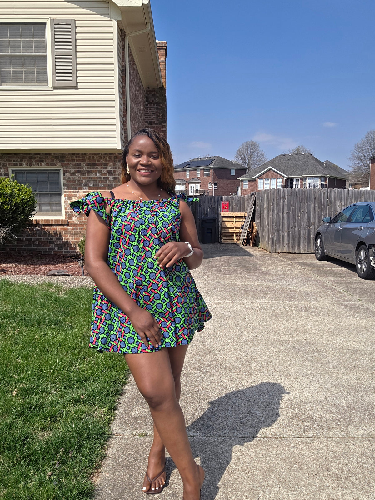 Ruby J’s Vibrant Ankara Tie-Shoulder Mini Dress